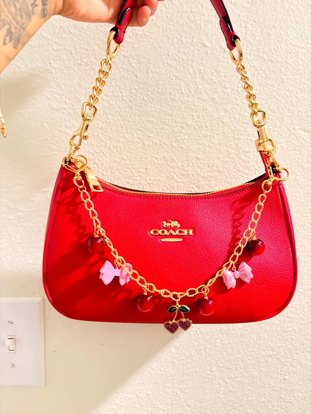 COACH Red Leather Shoulder Bag with Cherry Charm Chain